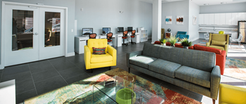 Community room with kitchen, flat screen tv and wifi workstations